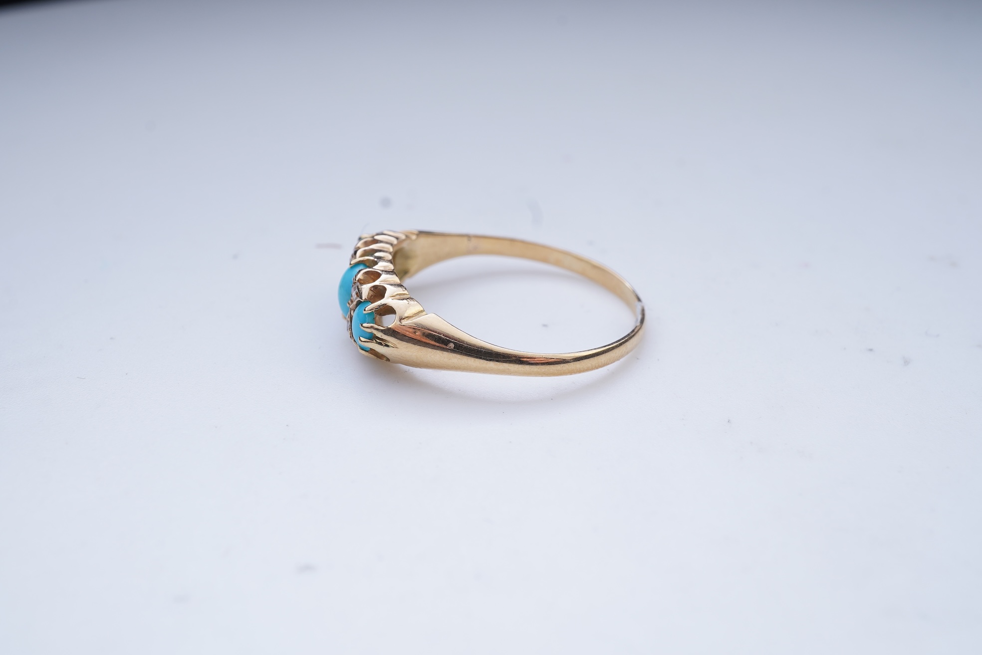 A turquoise and diamond ring, late 19th/early 20th century